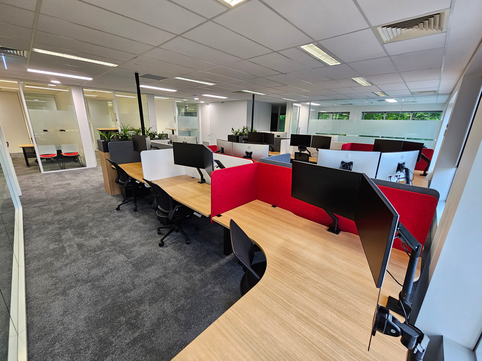 The Zuri Corner sit stand desk supplied and installed by Aurora Office Furniture at St Johns Ambulance in Barton ACT